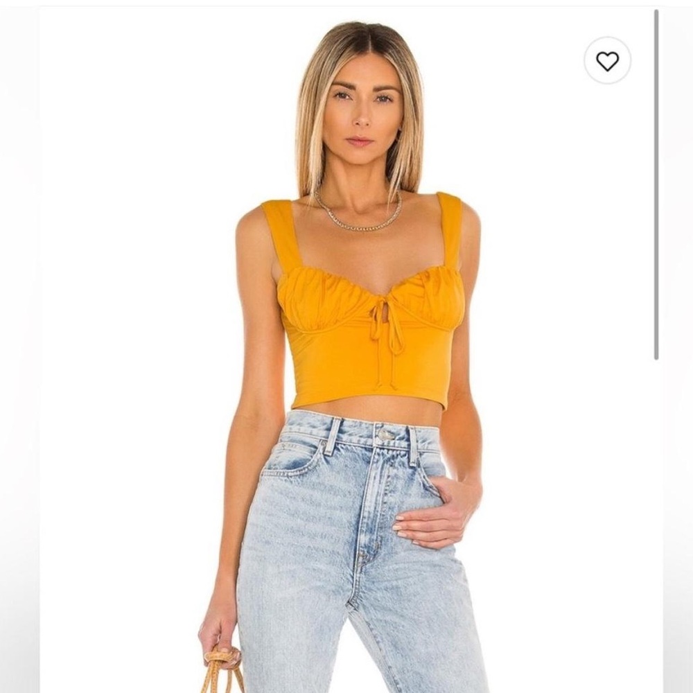 Camila Coehlo Daisy orange crop top from Revolve